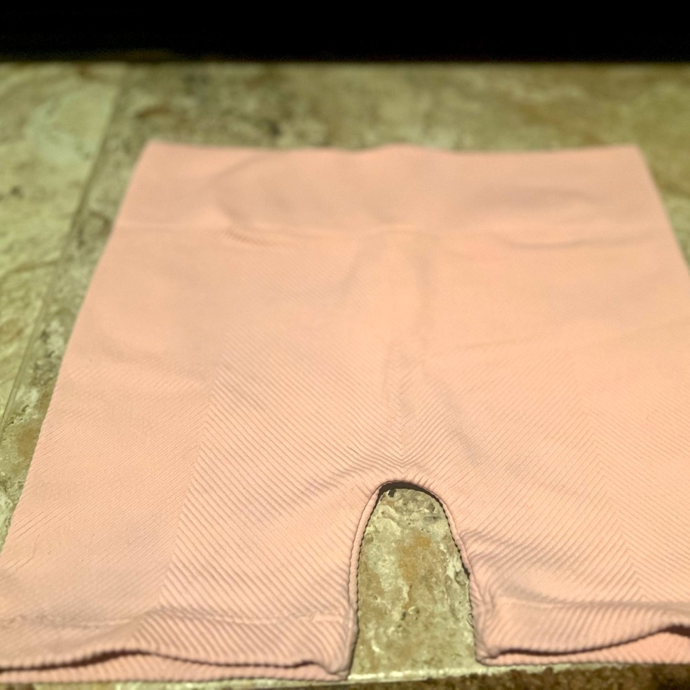 Light pink biker shorts.